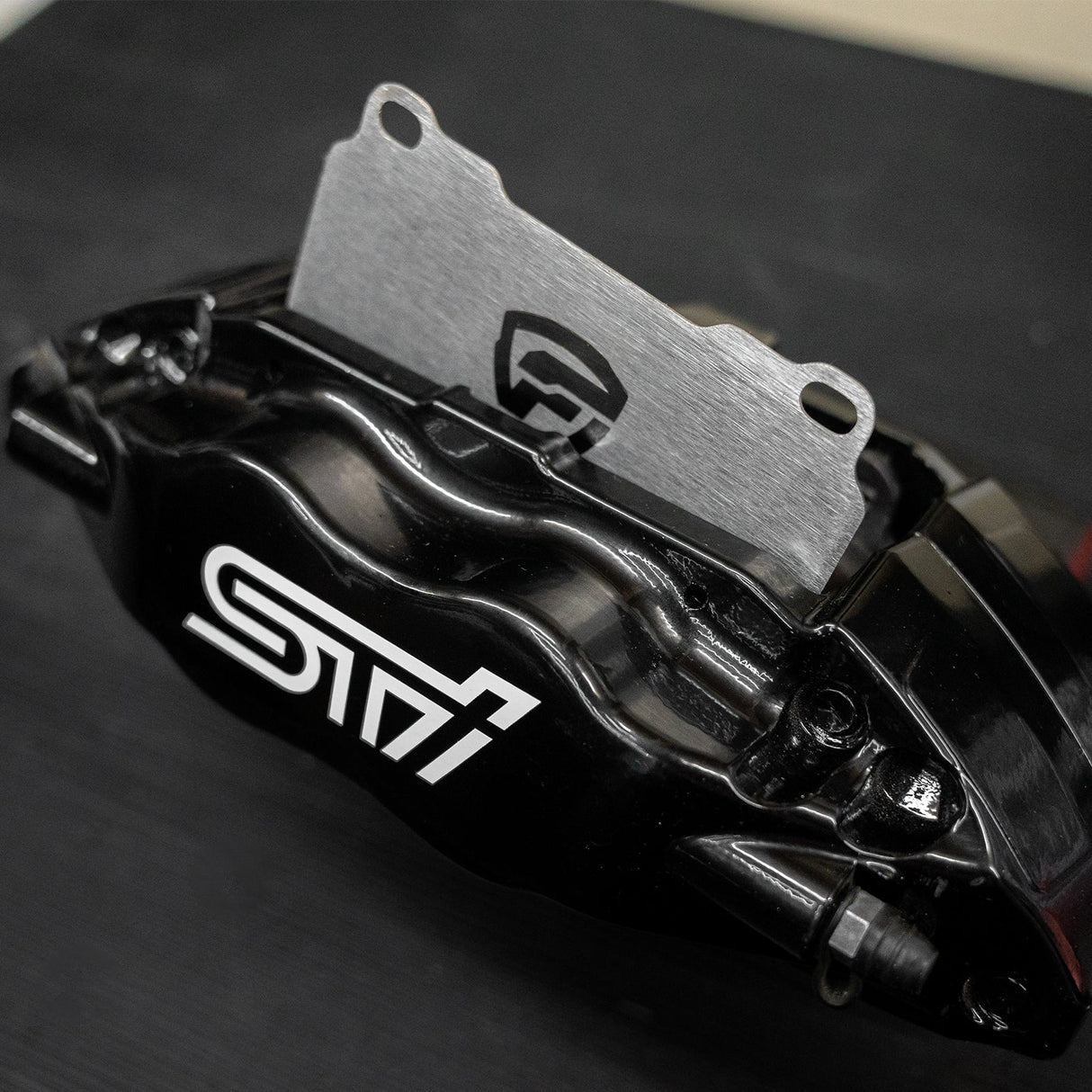 FactionFab Titanium Front Brake Shim Set