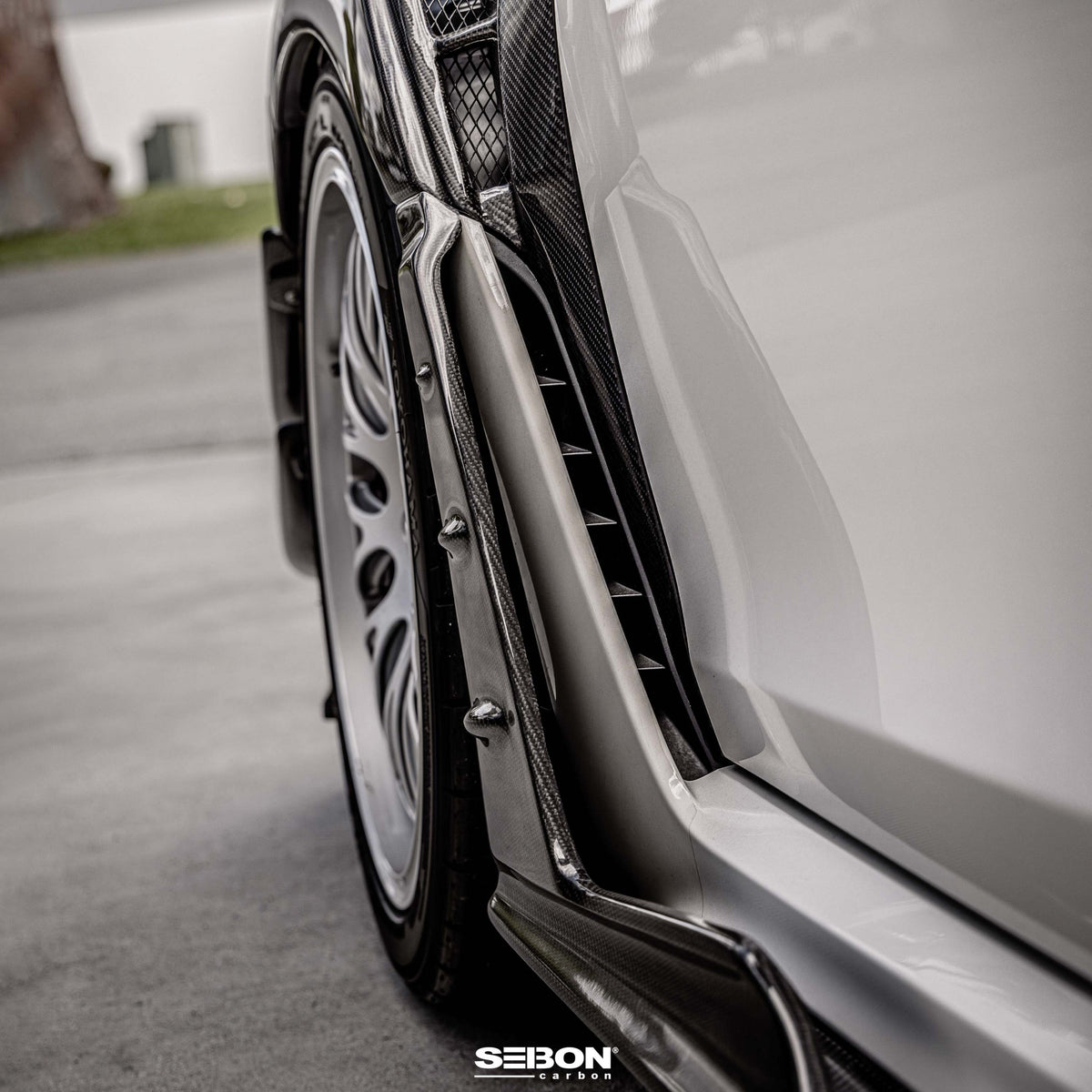 Seibon MB-Style Carbon Fibre Front Side Skirt Extensions